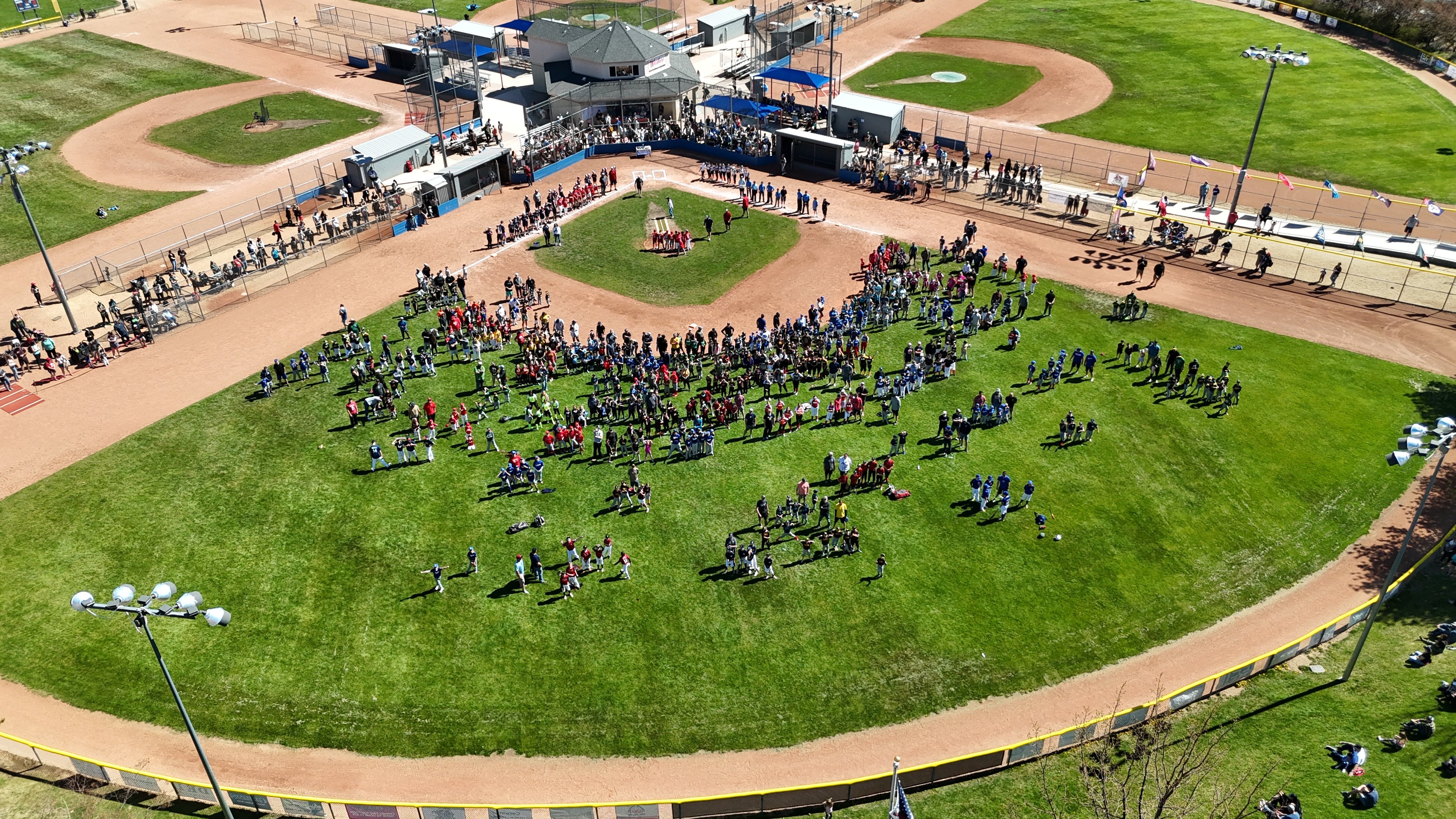 Aerial view of Washoe Little League's fields with players on the field. 