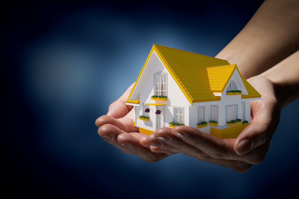 Clip art of home in hands